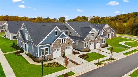 The village at cabin branch 5 Baths which includes a Two Car Garage, a Private Elevator, a 10x20' Deck, Tankless Water Heater, and a First Floor Full Bath!Come look at our lovely new homes at Gatherings® at Cabin Branch - an exciting new 55 + condos community located in Clarksburg, MD